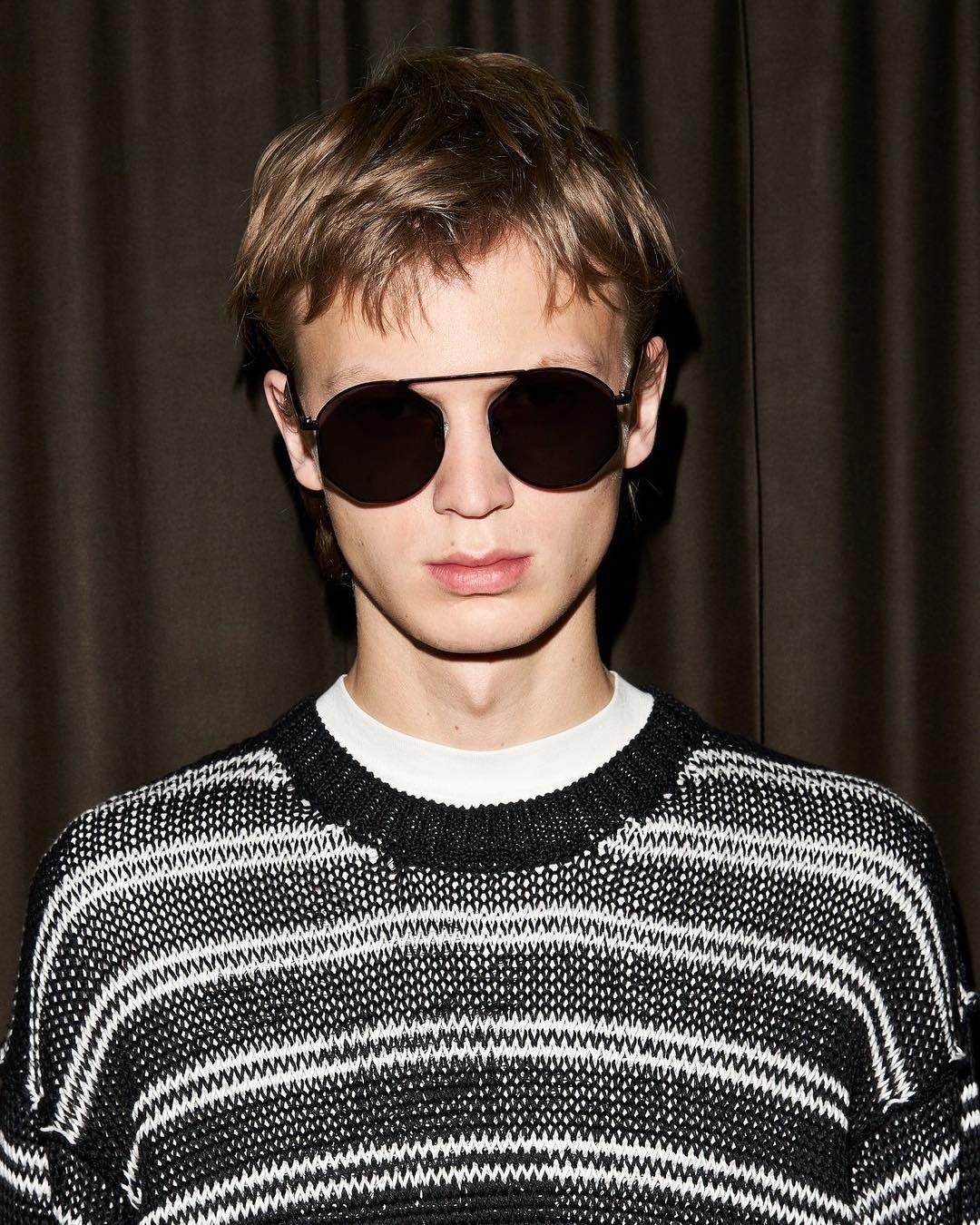 Jonas G (@jonasgloeer) for McQ's SS18 Eyewear campaign. Photography by Thomas Hauser and videography by Sharna Osborne. Hair by Naoki Komiya and make-up by Mathias van Hooff.