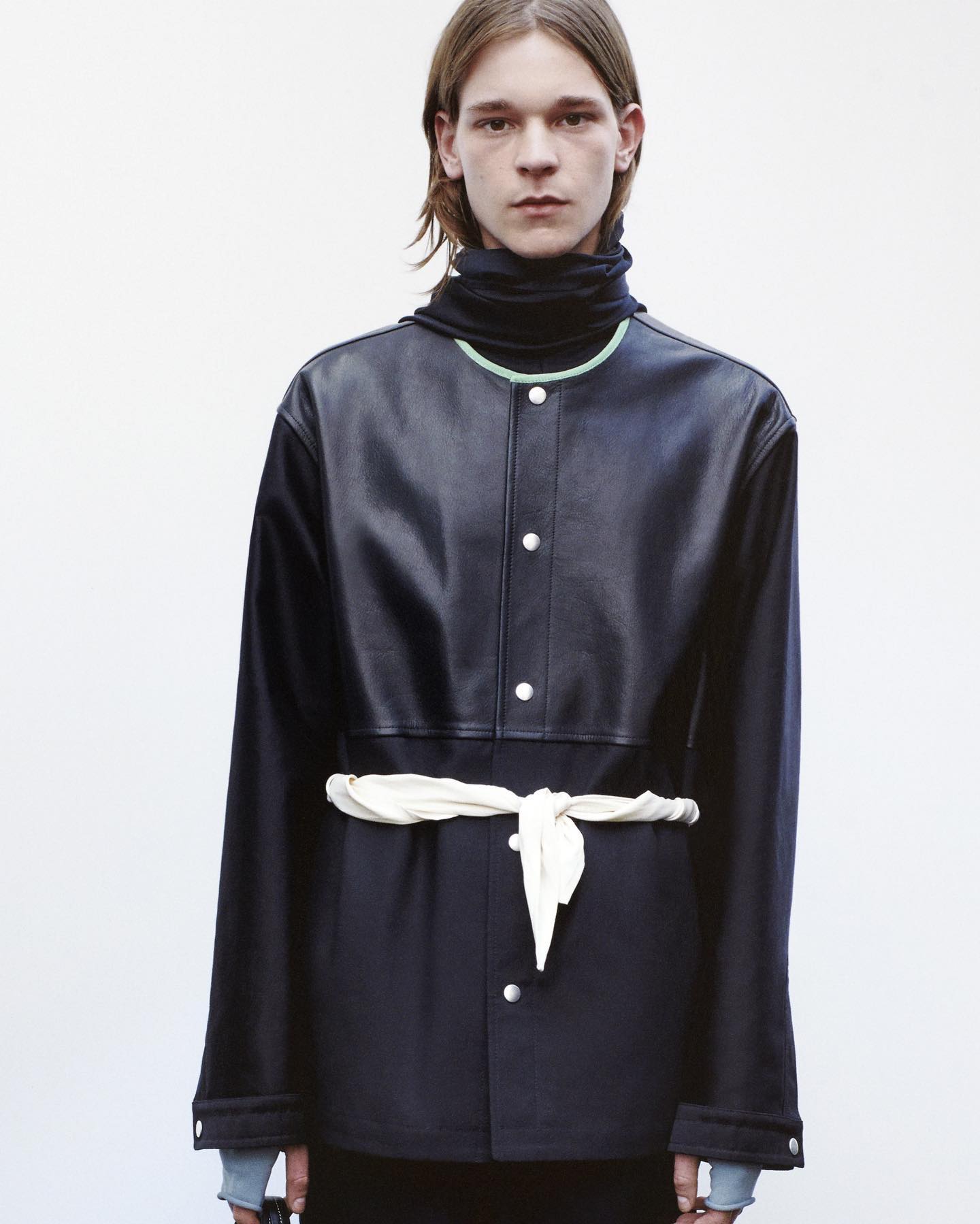 Jakob E (@jakob_eilinghoff) for Jil Sander SS21 by Lucie and Luke Meier. Art direction by Heiko Keinath, photography by Tim Elkaim, hair and makeup by Mark Hampton and casting by Henry Thomas for ARQA.