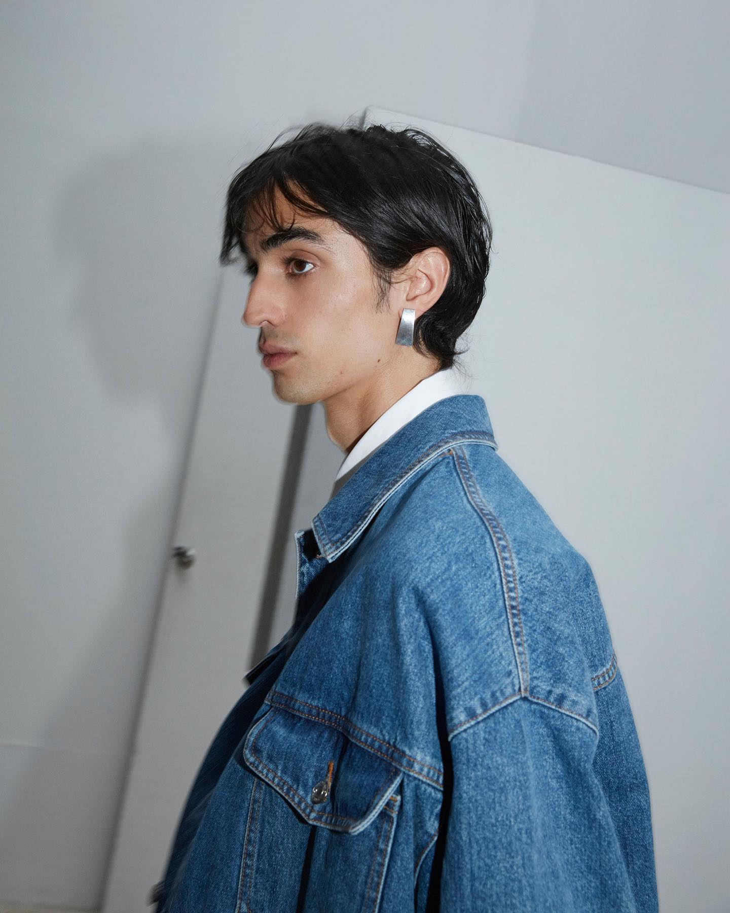 Aramish (@aramishmangi) for Trussardi Archive+Now 'NUWEV' by Fiona Sinha and Aleksandar Stanic SS21. Photography by Chris Rhodes, styling by Jodie Barnes, hair by Naoki Komiya, makeup by Mathias van Hooff and casting by Stacey Kom.