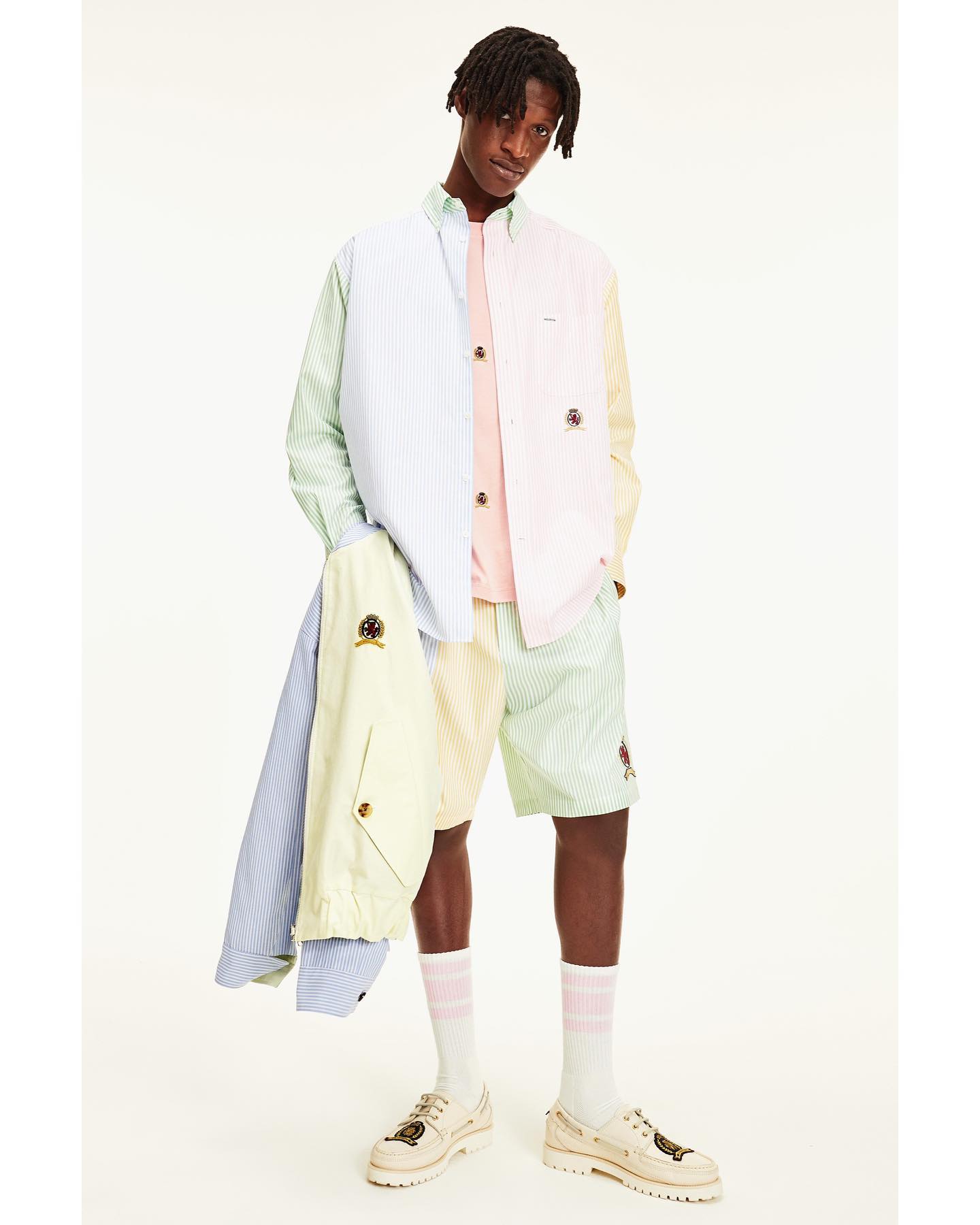 Ousmane (@ousousy) for Tommy Hilfiger Collection Spring 2021. Photography by Daniel Mulder, styling by Ferdi Sibbel, hair by Brent Lavett, makeup by Vanessa Chan and casting by Igor Guinau.