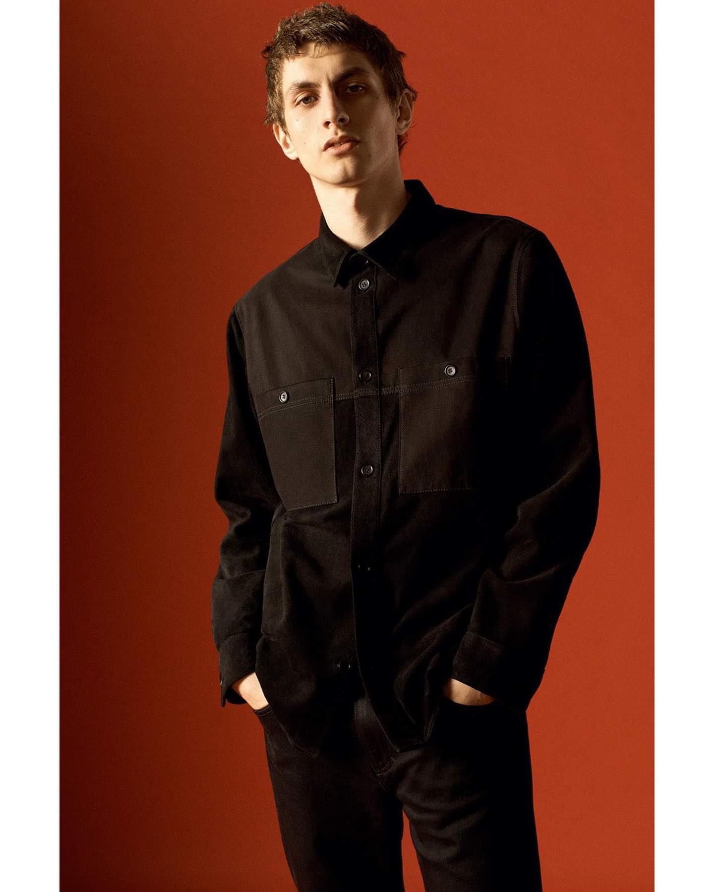 Henry (@henrykitcher) for COS Holiday 2020. Photography by Josh Olins, styling by Francesca Burns, hair by Shon, makeup by Niamh Quinn and casting by Establishment Casting.