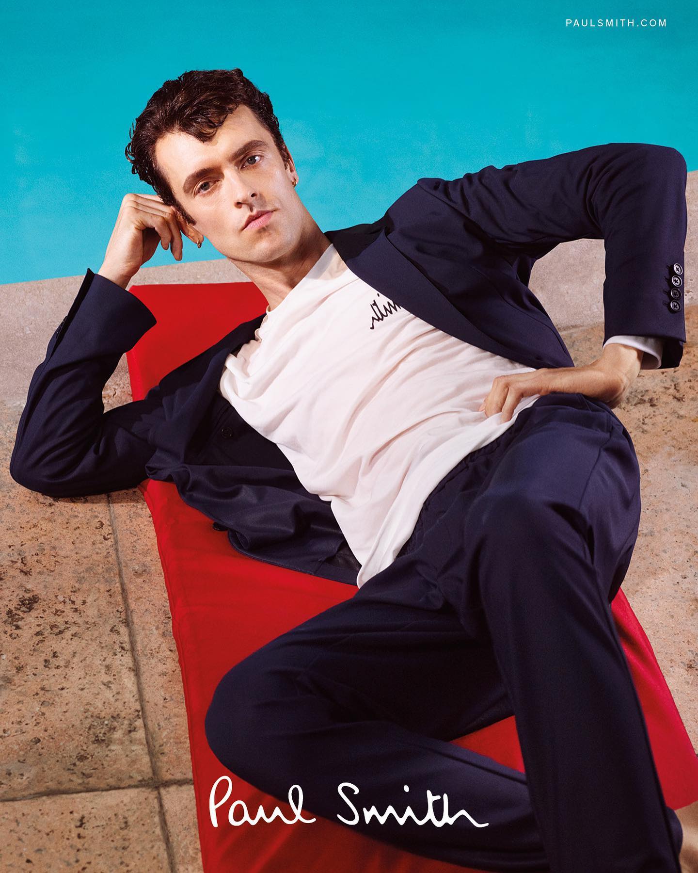 Scott for Paul Smith SS21 campaign. Photography by Mark Kean, styling by Julian Ganio, art direction by Matthew Mumford, hair by Louis Ghewy, makeup by Gemma Smith-Edhouse, casting by Jinjo.