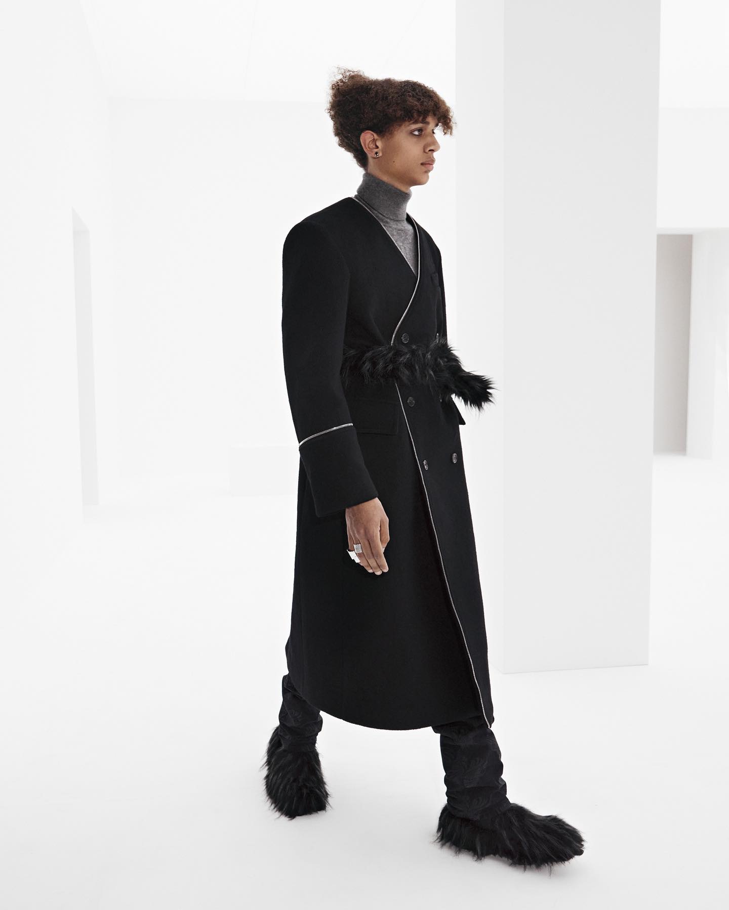Joshua for WE11DONE FW21. Photography and direction by Willy Vanderperre, styling by Olivier Rizzo,hair by Anthony Turner, makeup by Karin Westerlundd, manicure by Anatole Rainey, casting by Ashley Brokaw.