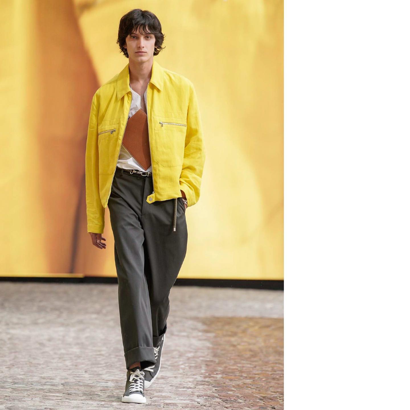 Dries for Hermès SS22 by Veronique Nichenian. Styling by Beat Bollinger, hair by Matt Mullhall, makeup by Alexandra Schiavi, casting by Sophie Bruynoghe.