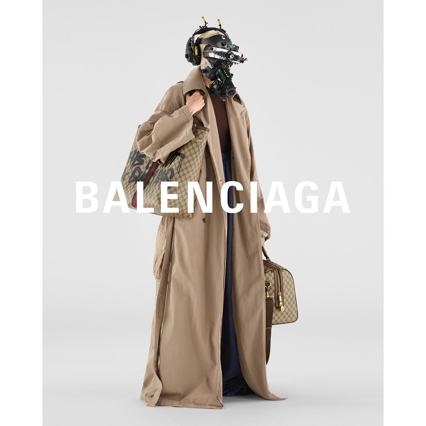 Minttu (@superminttu ) for Balenciaga Spring 22 Campaign. Photography by Andrea Artemisio, video direction by Yilmaz Sen, cybernetic face covering by Ikeuchi Hiroto.