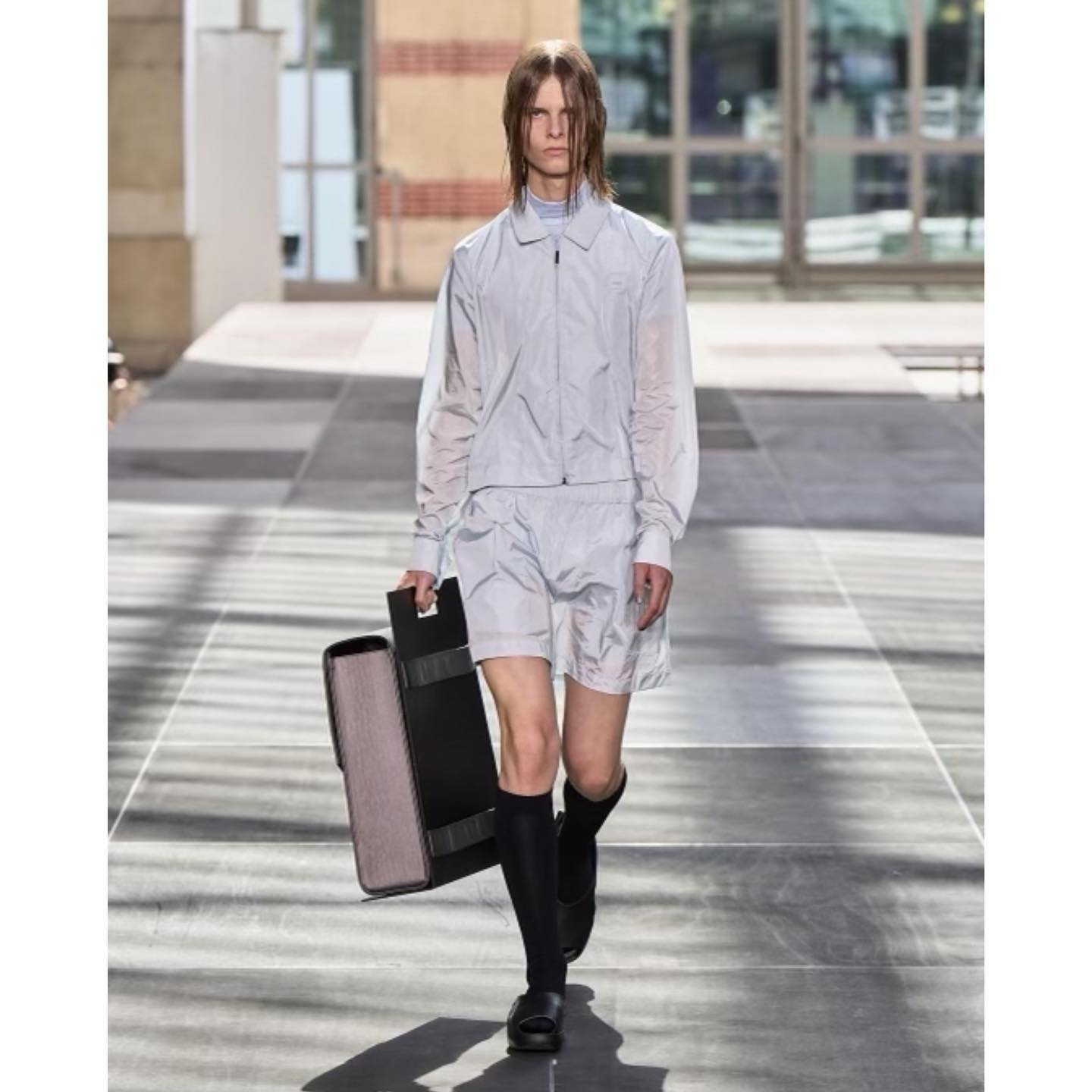 Paul (@paulktth ) for Rains SS23. Styling by Pernille Teisbaek, hair by Gary Gil, make up by Ana Takahashi, casting by Arthur Méjean.