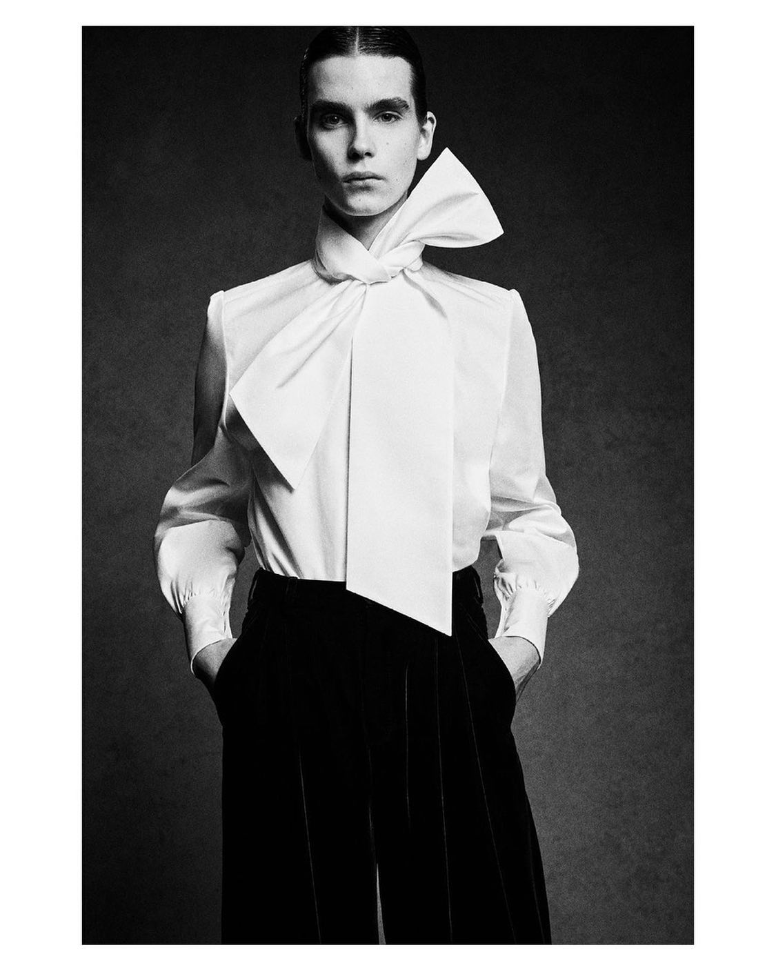 Frederic (@worldbyfred ) Look 1 for Saint Laurent FW23. Photography by Rory Van Milligen, styling by Paul Sinclaire, hair by Duffy, casting by Samuel Ellis for DM Casting.