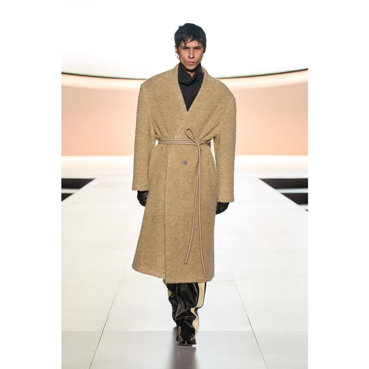 Emilio (@zero_ko0l ) for Fear Of God FW23. Styling by Carlos Nazario, hair by Jawara, make-up by Yadim Carranza, casting by Rachel Chandler for Midland.