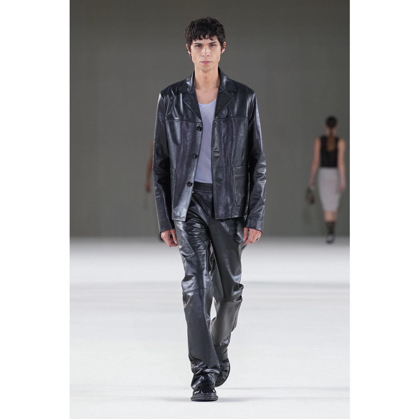 Emilio (@zero_ko0l ) for Ami SS24. Styling by Carlos Nazario, casting by Piergiorgio forDM Casting.