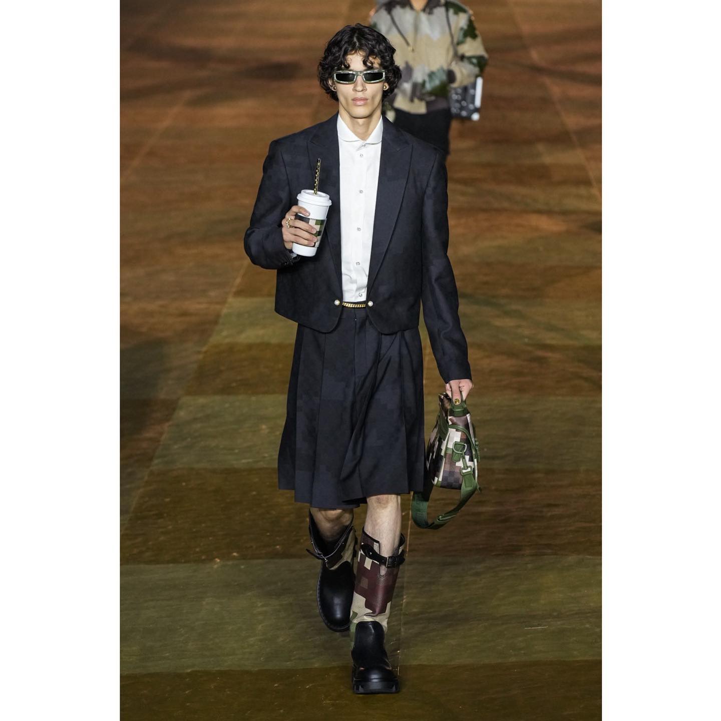 Kaplan (@kapo.h ) for Louis Vuitton SS24. Styling by Matthew Henson, hair by Karim Belghiran, make-up by Pat McGrath, casting by Establishment.