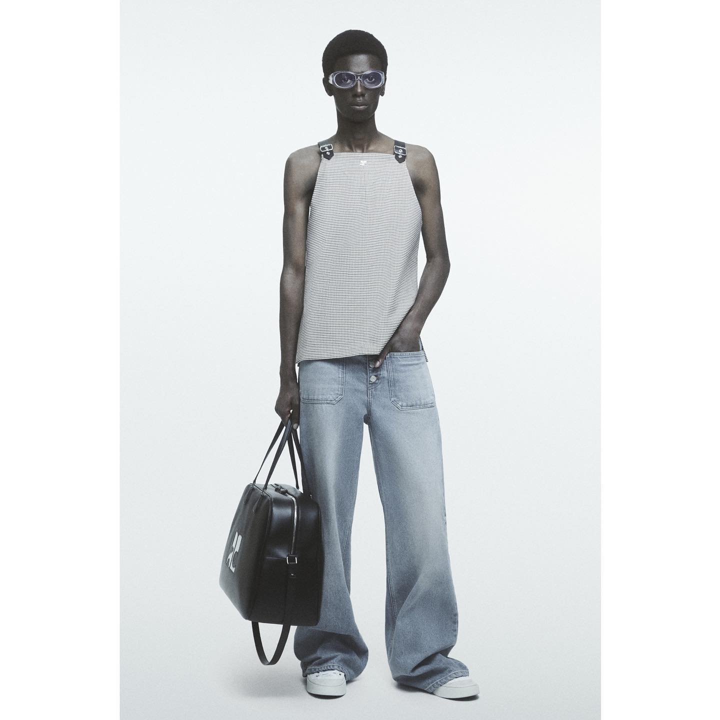 Noel A (@ix.noel.ix ) for Courrèges SS24. Photography by Robin Galiegue, styling by Marie Chaix, hair by Akemi Kishida, make-up by Anthony Preel, casting by DM Casting.