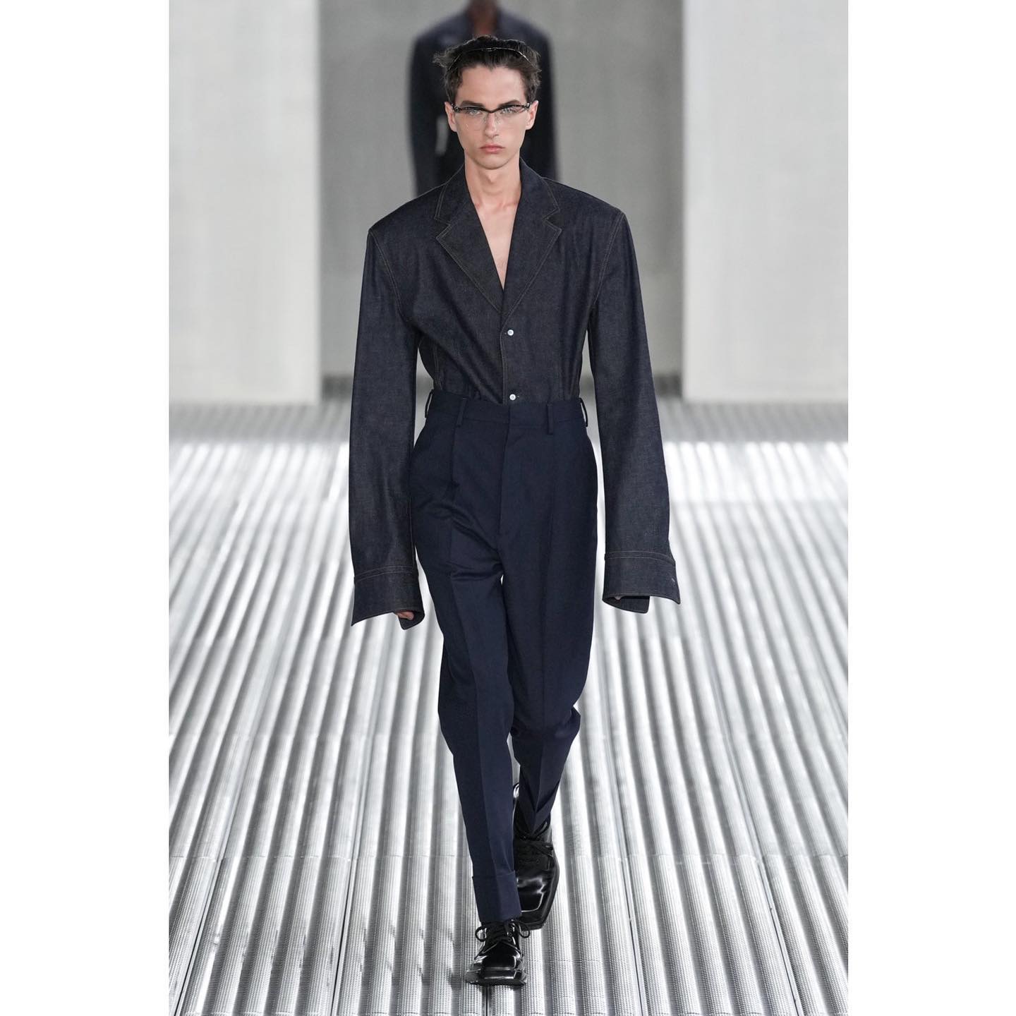 Viktor K (@viko63 ) for Prada SS24. Styling by Olivier Rizzo, hair by Guido Palau, make-up by Pat McGrath, casting by Ashley Brokaw.