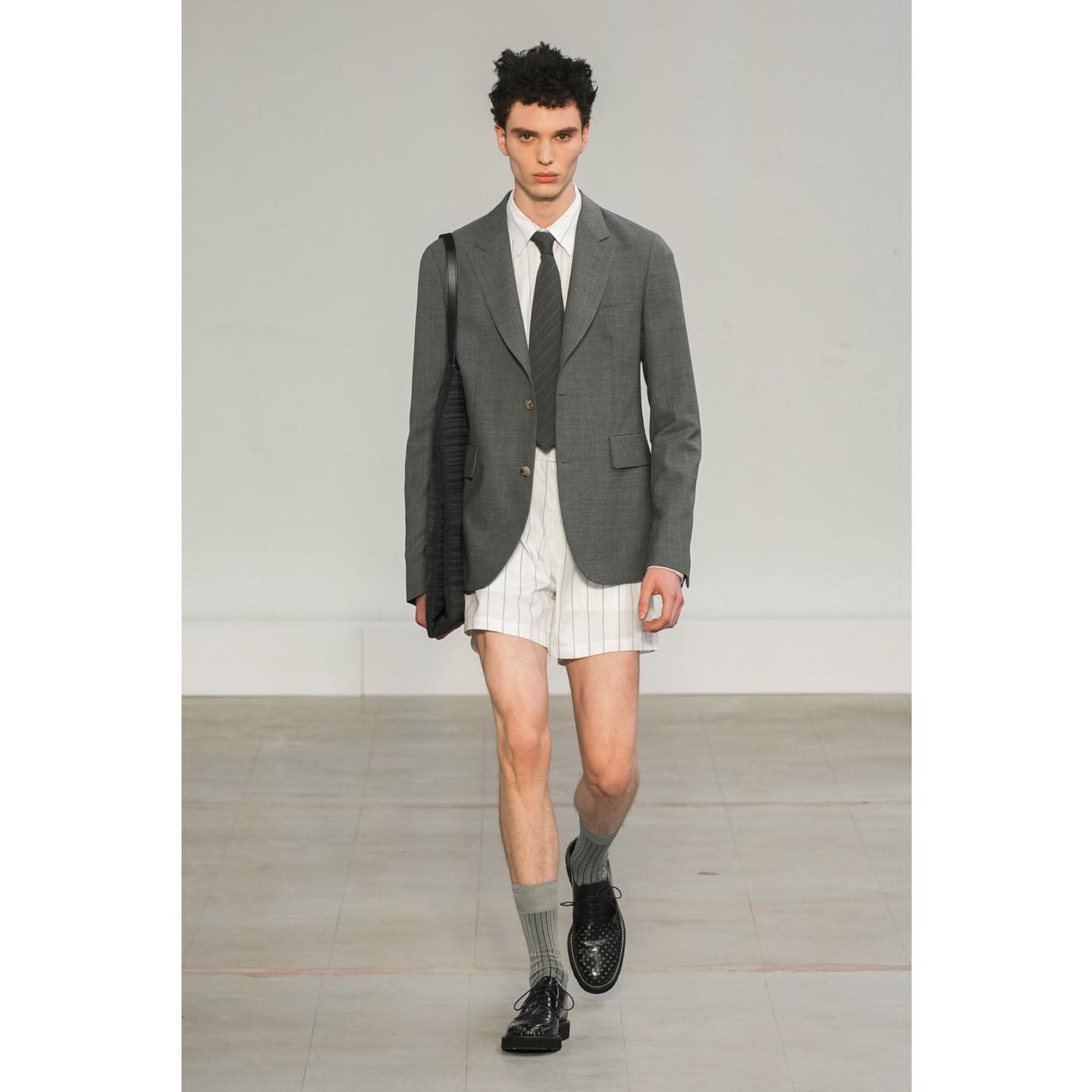 Zachary (@zacolive ) for Paul Smith SS24. Styling by Julian Ganio, casting by Ben Grimes.