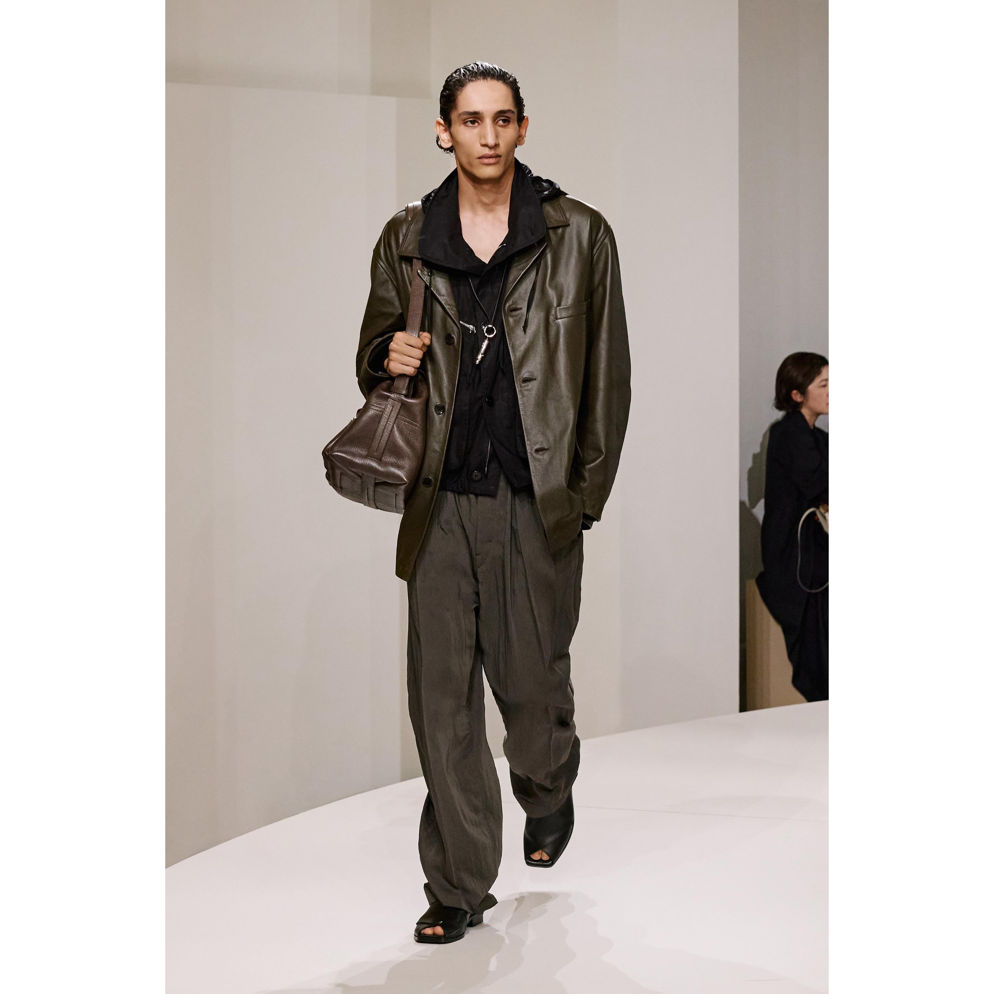 Bilal B (@bilal.brts ) for Lemaire SS25. Styling by Benoit Bethume, casting by Henry Thomas for Arqa.