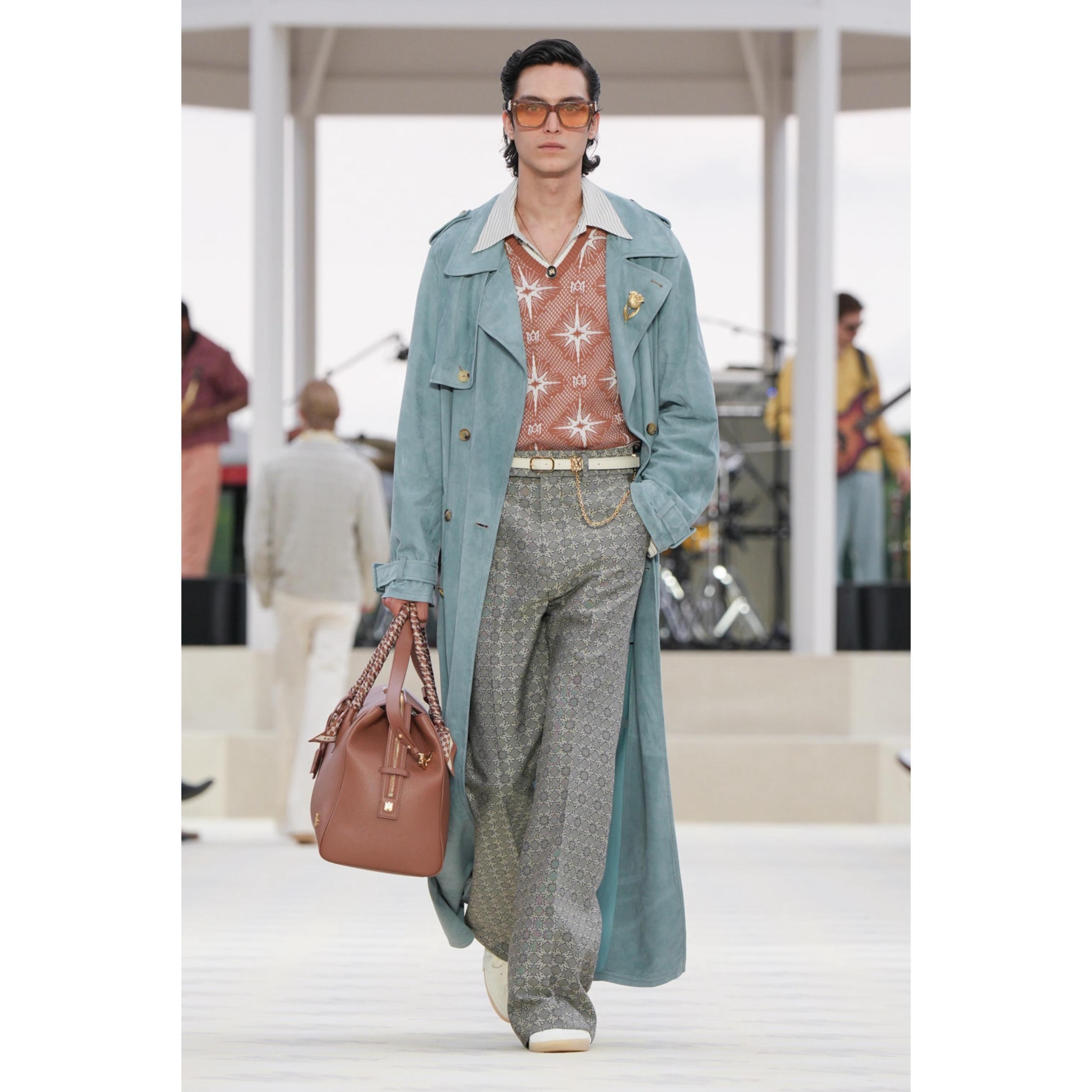 Dries (@dries.haseldonckx ) for Amiri SS25. Styling by Ellie Grace Cumming, hair by Eugene Souleiman, make-up by Lucy Bridge, casting by Noah Shelley.