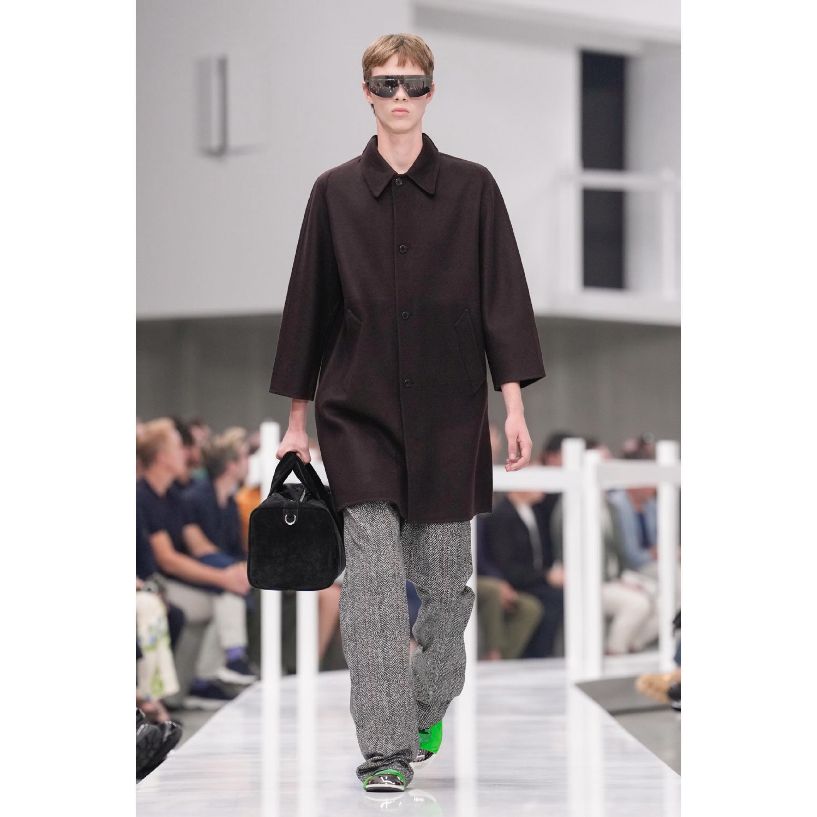 Jim (@0311.jim ) debut exclusive for Prada SS25. Styling by Olivier Rizzo, hair by Guido Palau, make-up by Lynsey Alexander, casting by Ashley Brokaw.