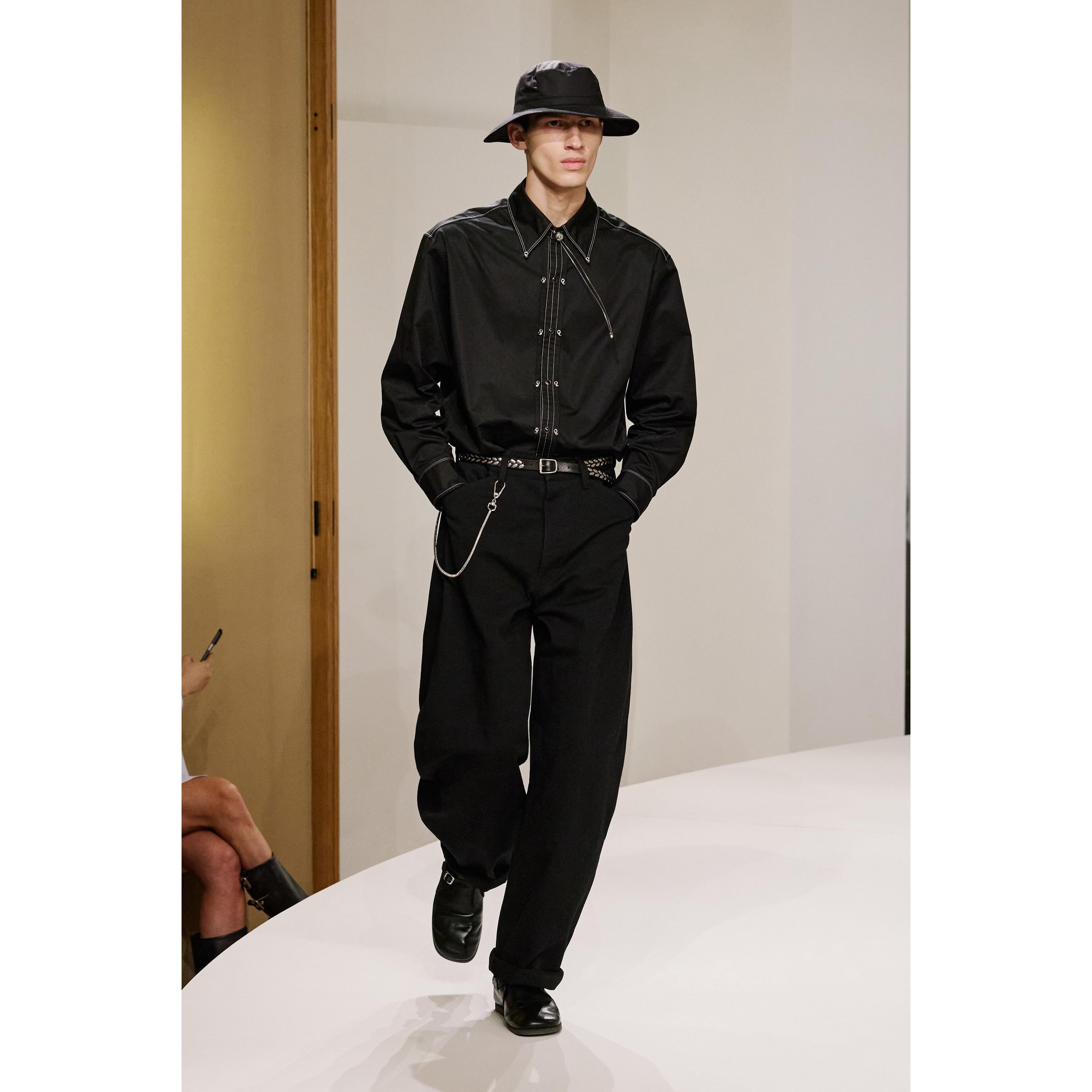 Kaplan (@kapo.h ) for Lemaire SS25. Styling by Benoit Bethume, casting by Henry Thomas for Arqa.