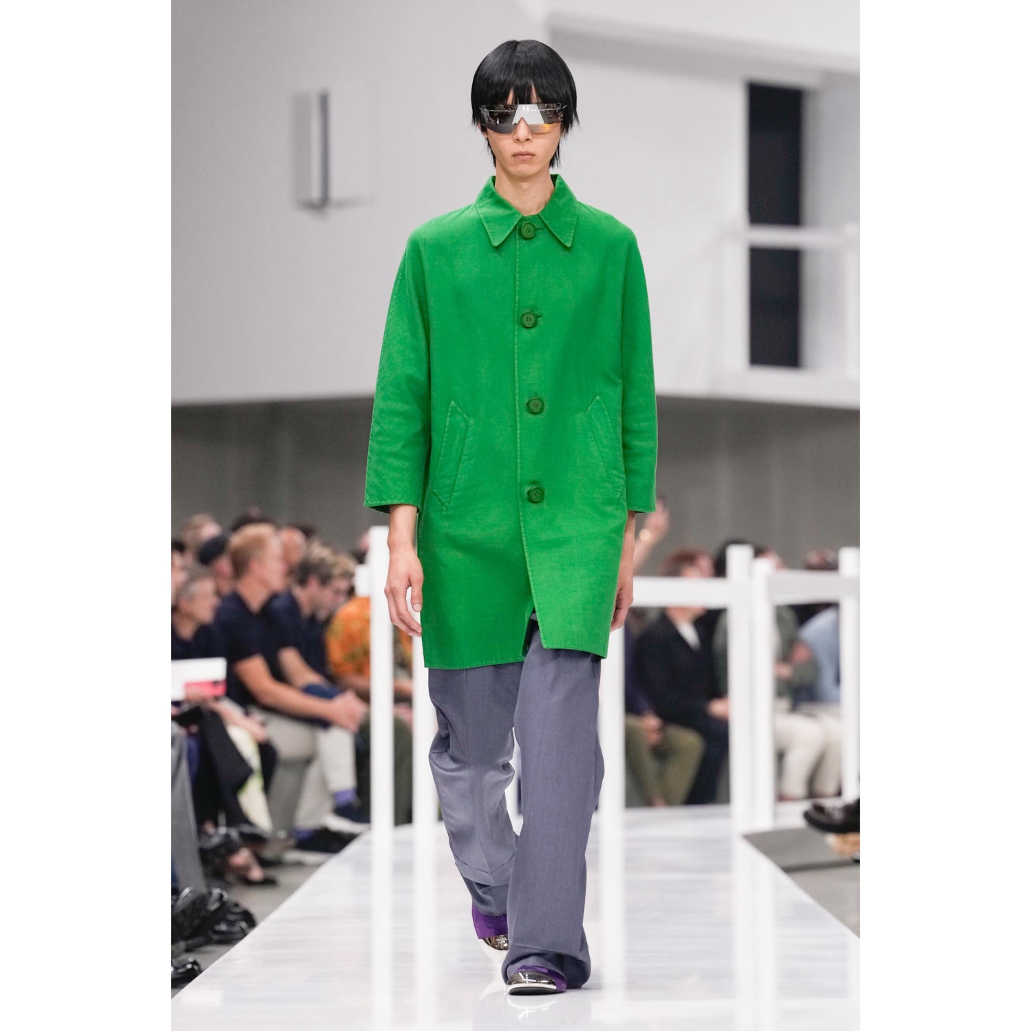 Min-Jae (@ourbliss2day ) for Prada SS25. Styling by Olivier Rizzo, hair by Guido Palau, make-up by Lynsey Alexander, casting by Ashley Brokaw.