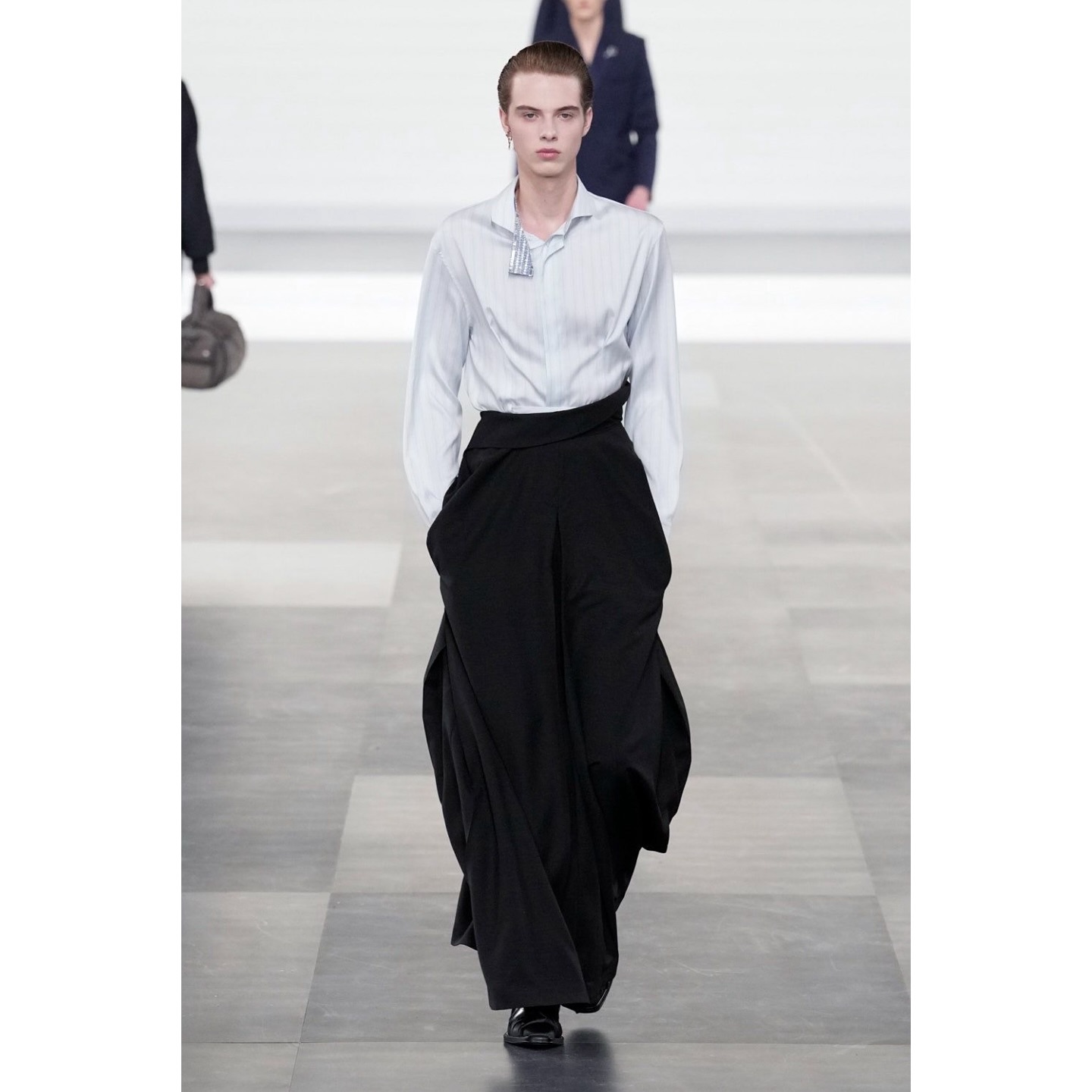 Jim (@0311.jim ) for Dior AW25. Creative direction by Kim Jones, styling by Melanie Ward, hair by Guido Palau, makeup by Peter Phillips, casting by Shelley Durkan.