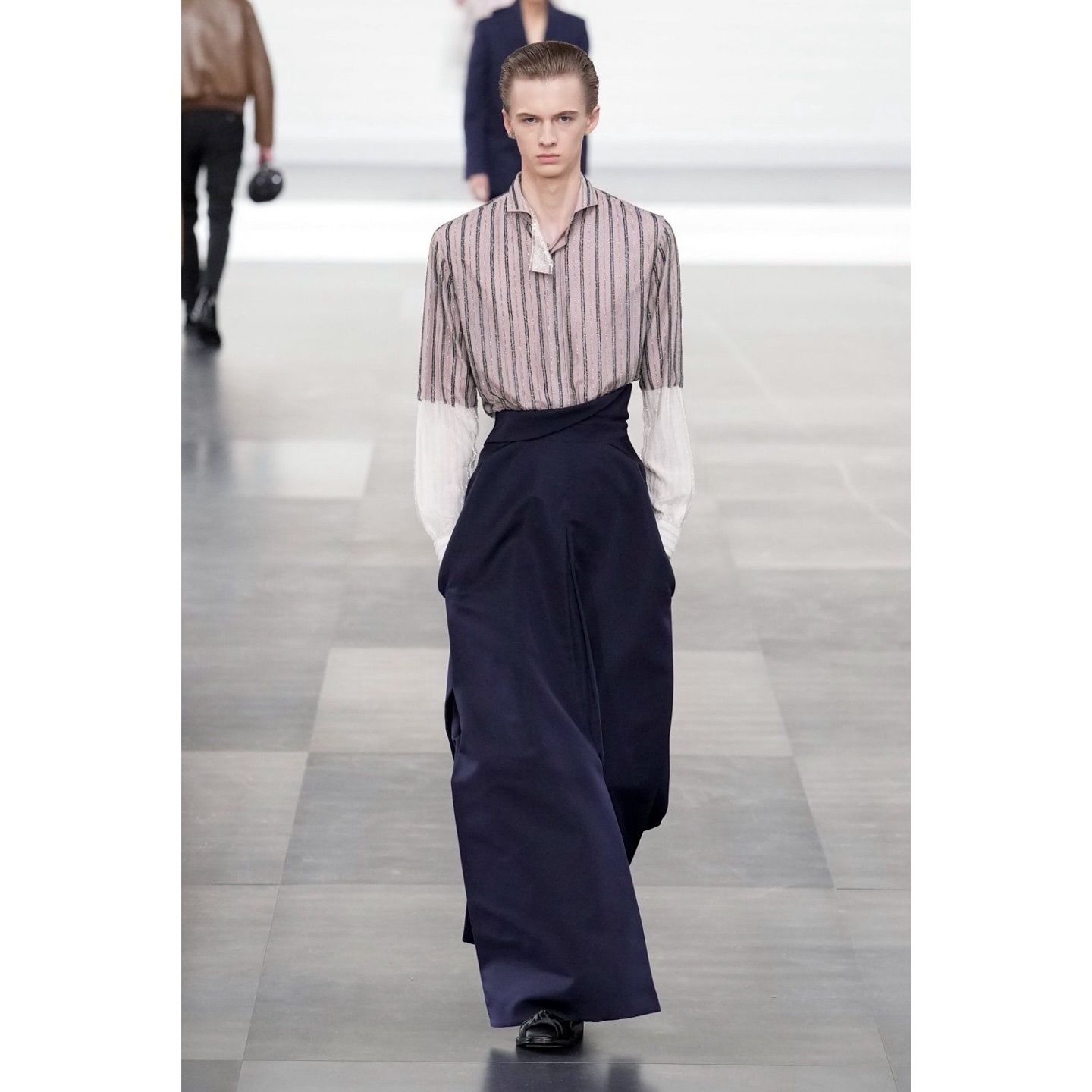 Jules N (@julenvn ) for Dior AW25. Creative direction by Kim Jones, styling by Melanie Ward, hair by Guido Palau, makeup by Peter Phillips, casting by Shelley Durkan.