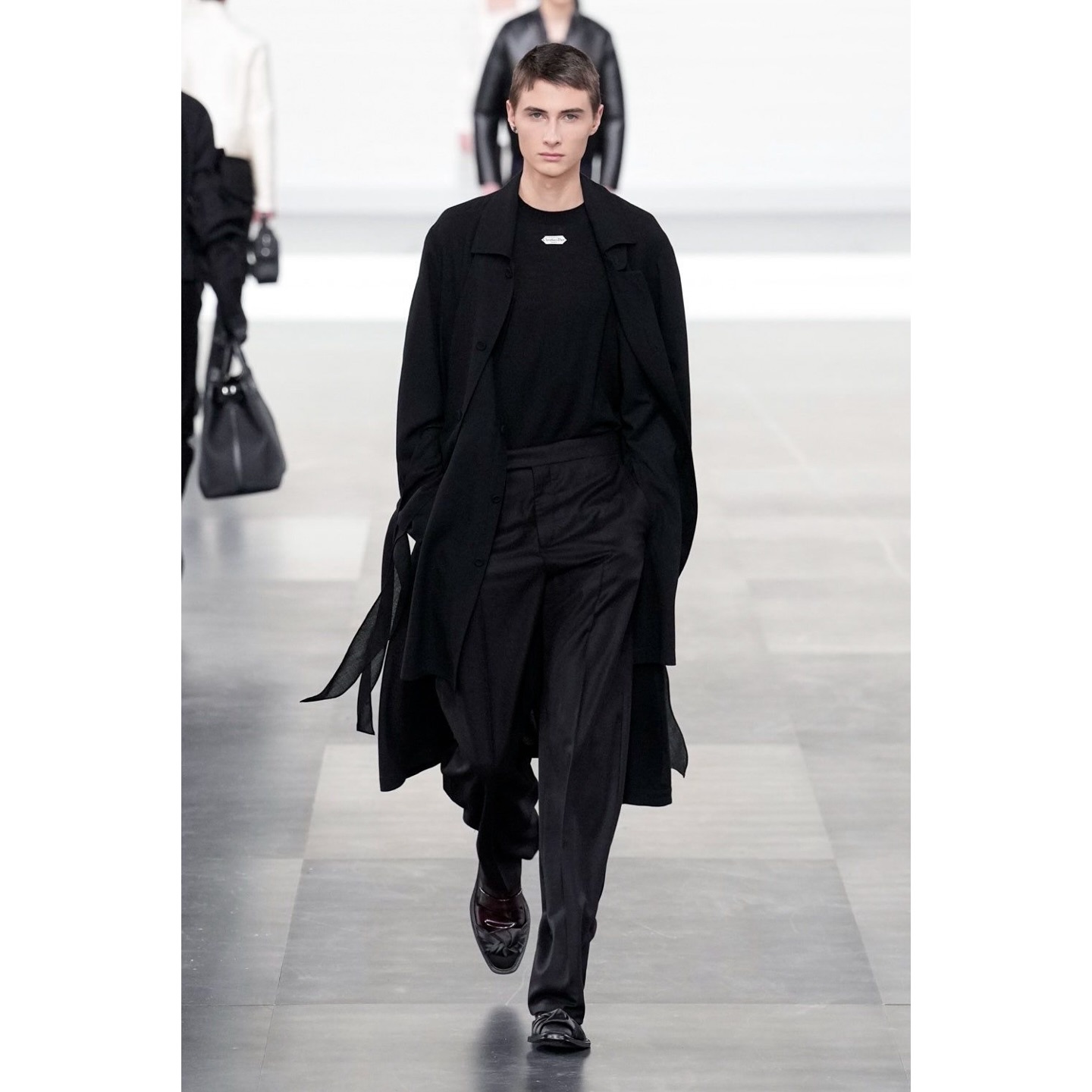 Marek (@mardob06 ) Debut for Dior AW25. Creative direction by Kim Jones, styling by Melanie Ward, hair by Guido Palau, makeup by Peter Phillips, casting by Shelley Durkan.